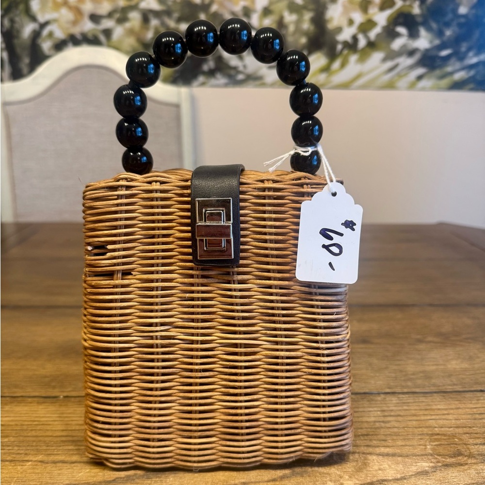 Elegant Brown Wicker Handbag with Black Accents